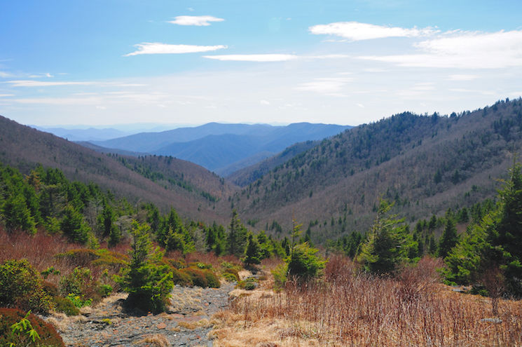 view of mountains with blue skies