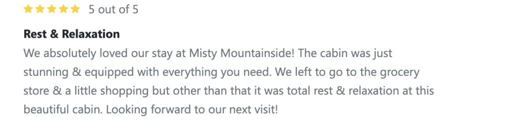 5 star review talking about rest & relaxation granted from the misty mountainside cabin and how it was equipped