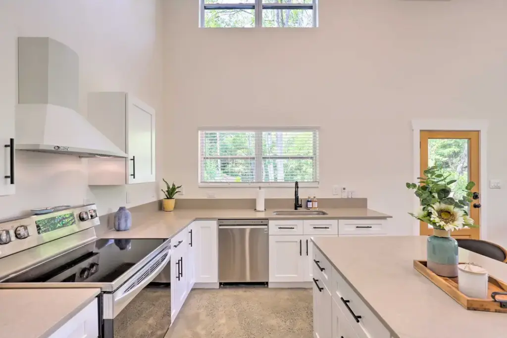 open kitchen format with a door leading to the backyard