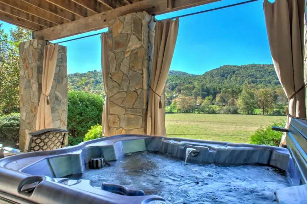 private hot tub with stone columns