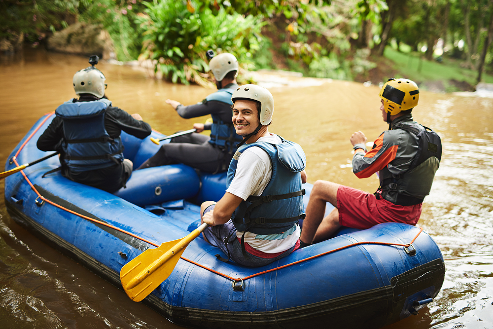 People on a rafting boat